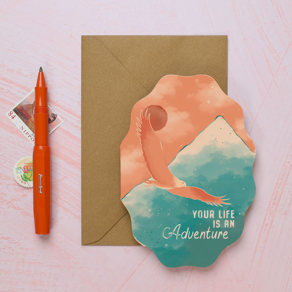 wavy greeting card illustrated by I am Roxanne of an eagle flying over a mountain for the Soul Traveller collection.